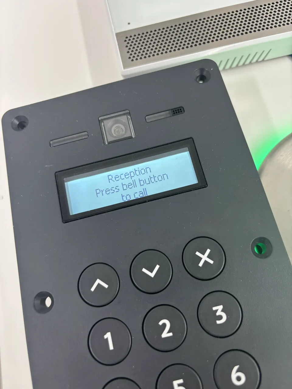 Door entry intercom with a camera, display and keypad